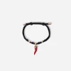 Fabric Good luck bracelet with enameled yellow gold pendant charm