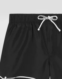 Fabric swim trunks with bandanna print
