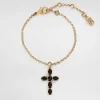 Fine link bracelet with cross charm