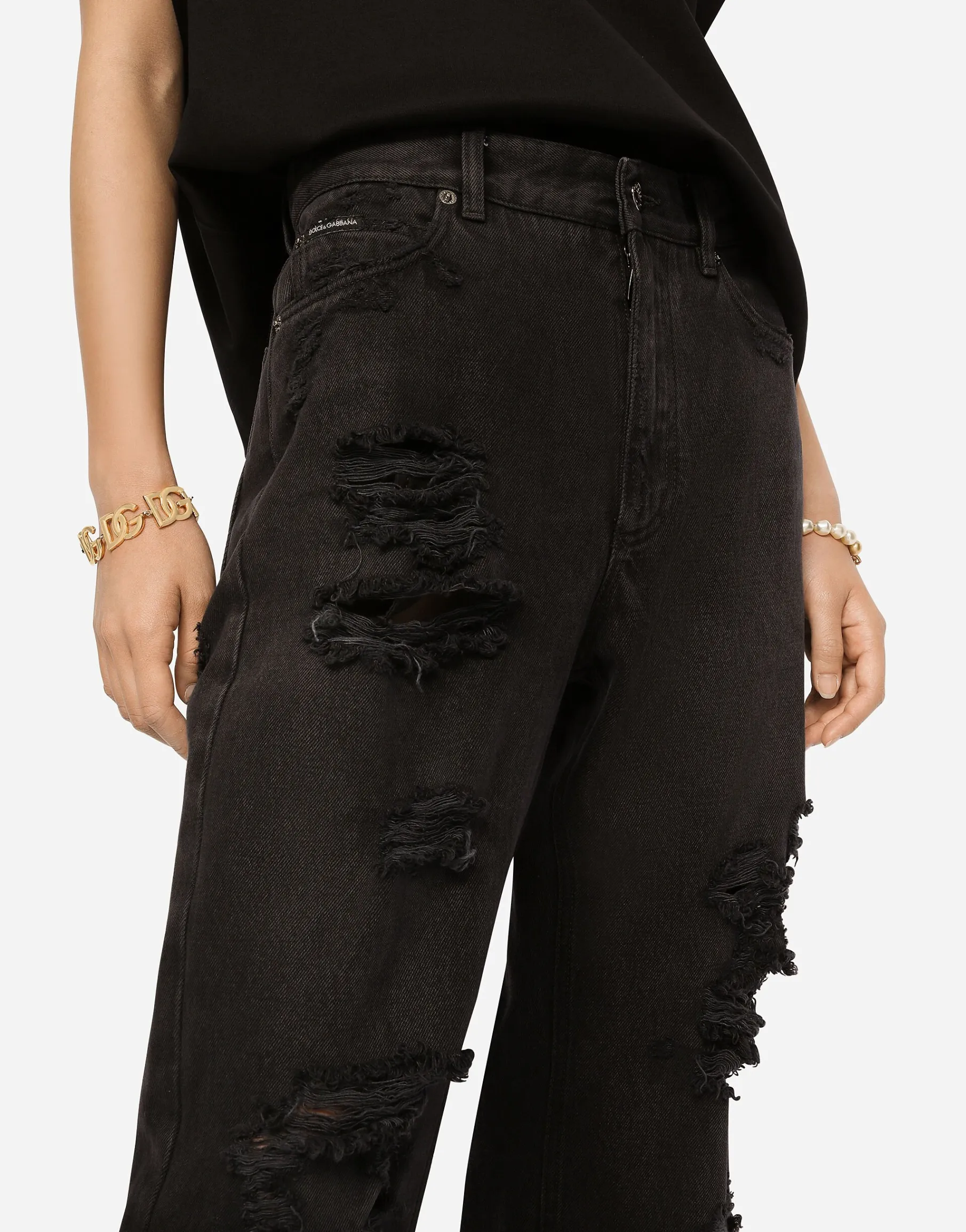 Flared jeans with ripped details