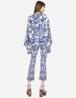 Flared trumpet-leg charmeuse pants with majolica print