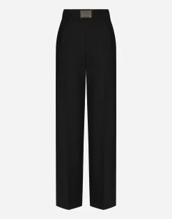 Flared wool pants with logo tag