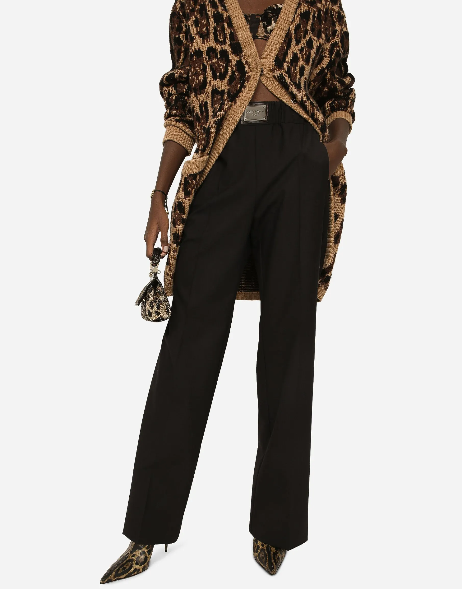 Flared wool pants with logo tag