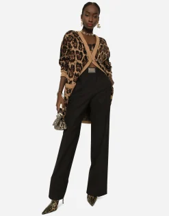 Flared wool pants with logo tag