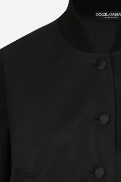 Gabardine bomber jacket, waxed on reverse, with branded tag