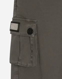 Gabardine cargo pants with branded tag