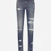 Girly jeans with ripped details