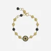 Gold bracelet with black sapphires