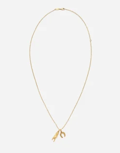 Good luck hand with horn and horseshoe pendants on yellow gold chain