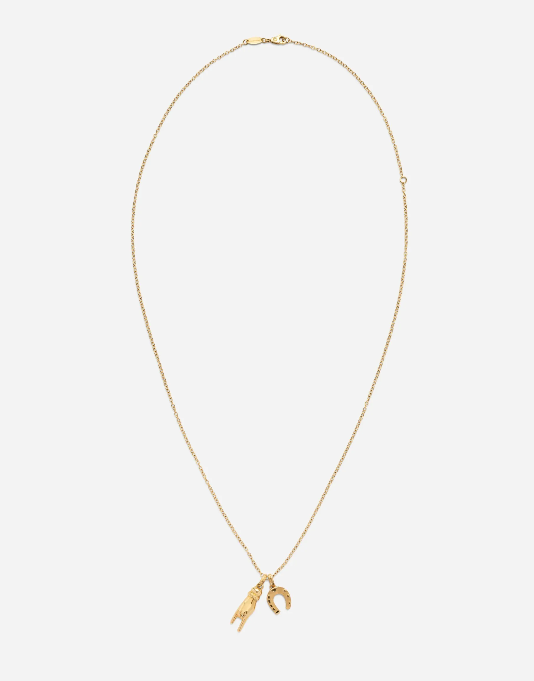 Good luck hand with horn and horseshoe pendants on yellow gold chain