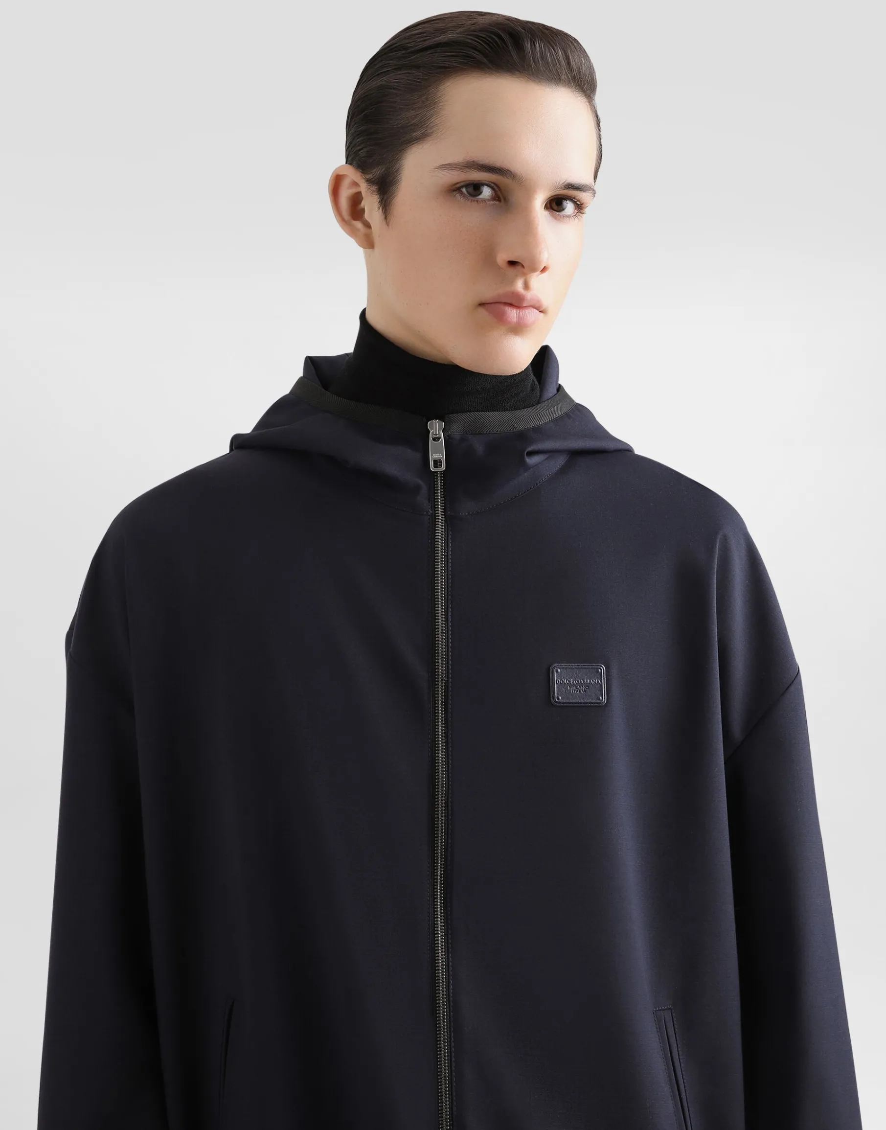 Hooded woolen jacket with tag