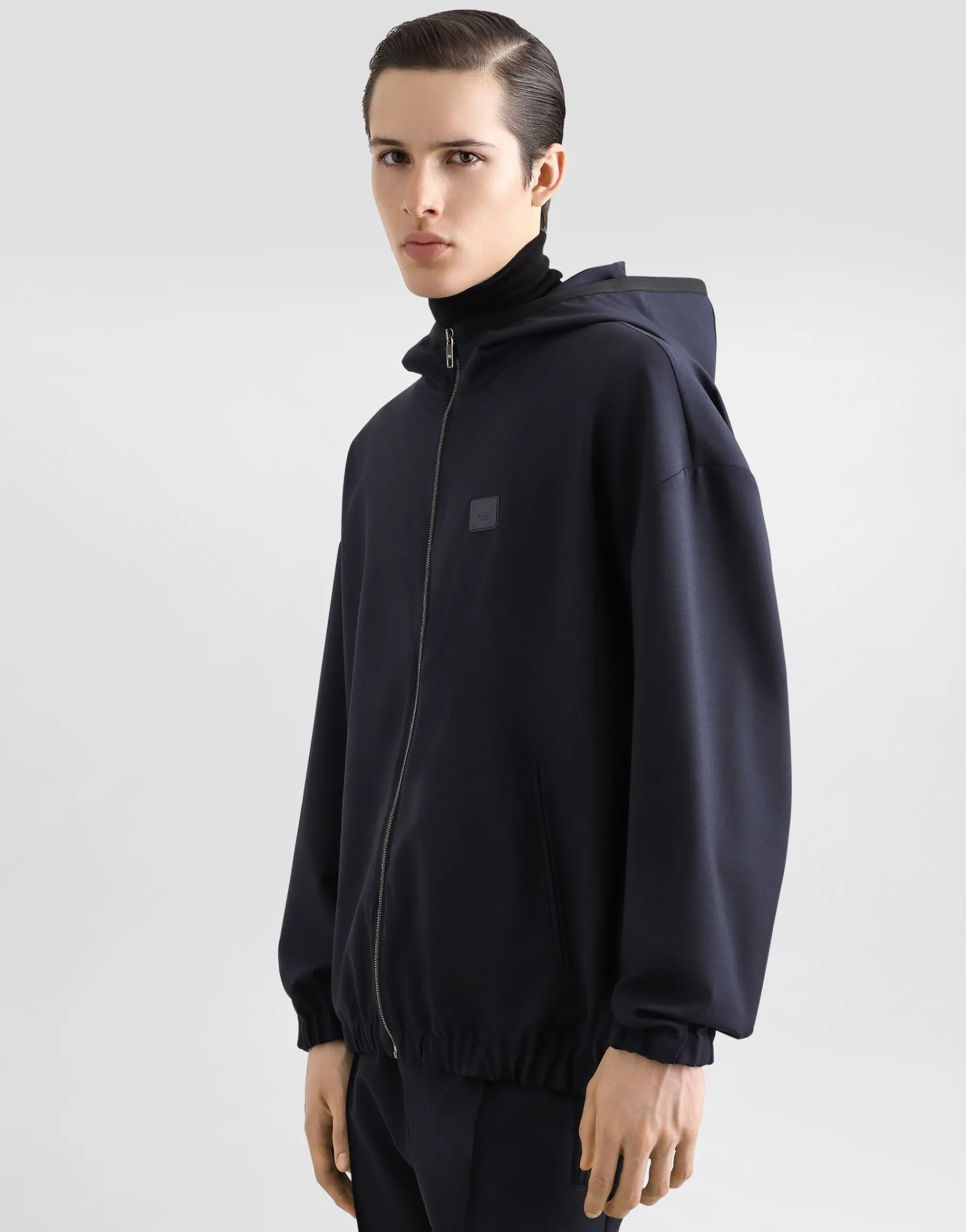 Hooded woolen jacket with tag