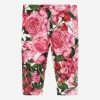 Interlock leggings with rose print over a white background