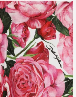 Interlock leggings with rose print over a white background