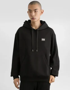 Jersey hoodie with branded tag