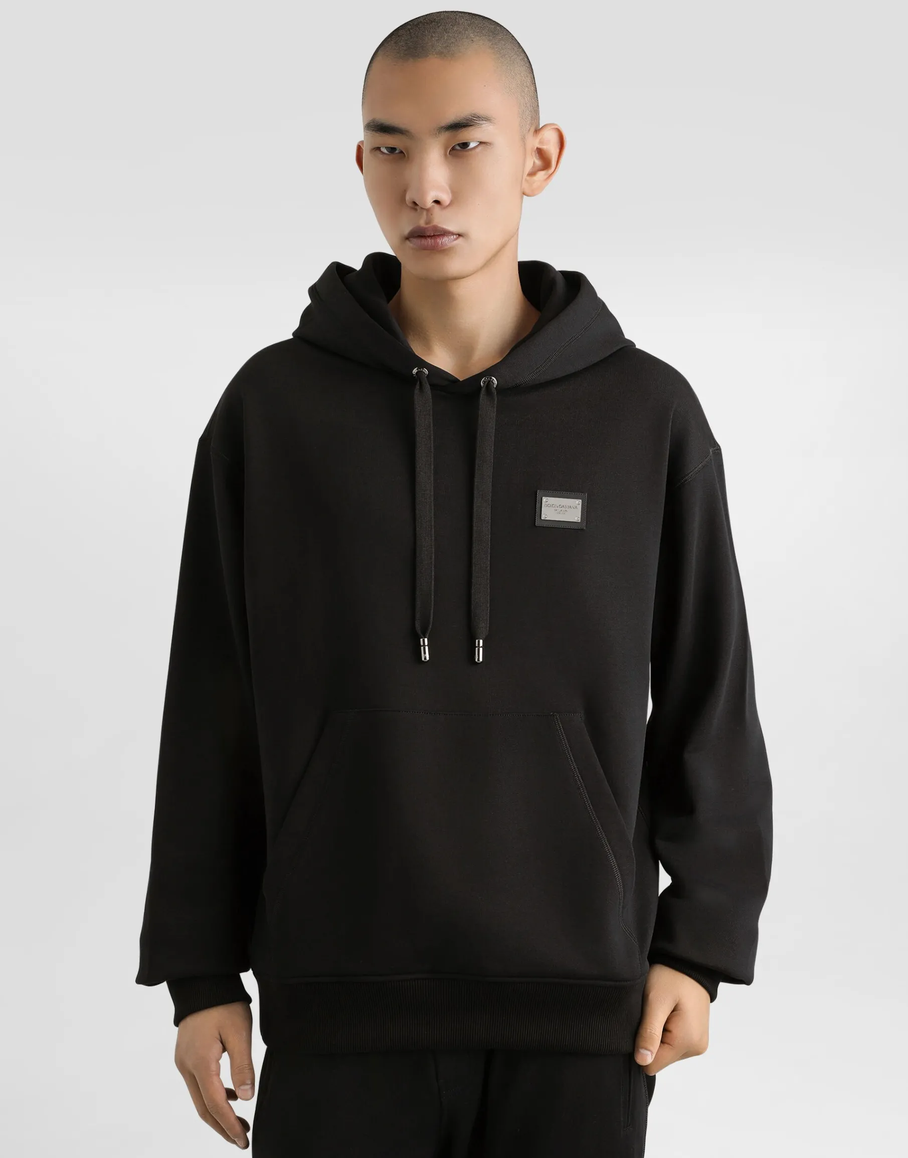 Jersey hoodie with branded tag