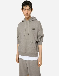 Jersey hoodie with branded tag