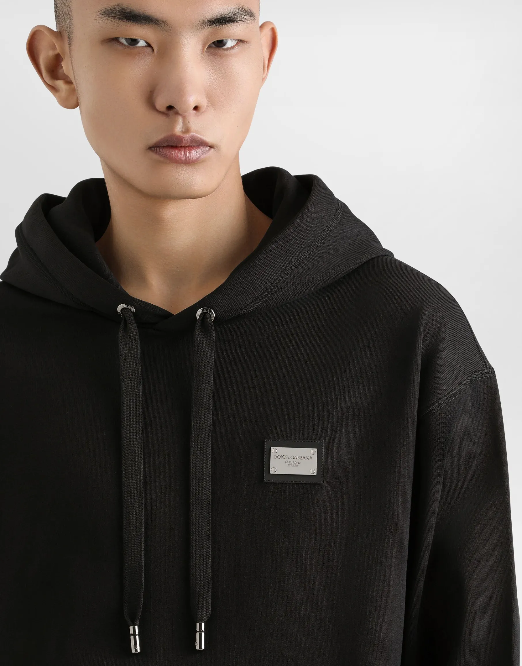 Jersey hoodie with branded tag