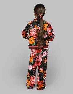 Jersey sweatshirt with floral print over a black background