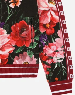 Jersey sweatshirt with floral print over a black background
