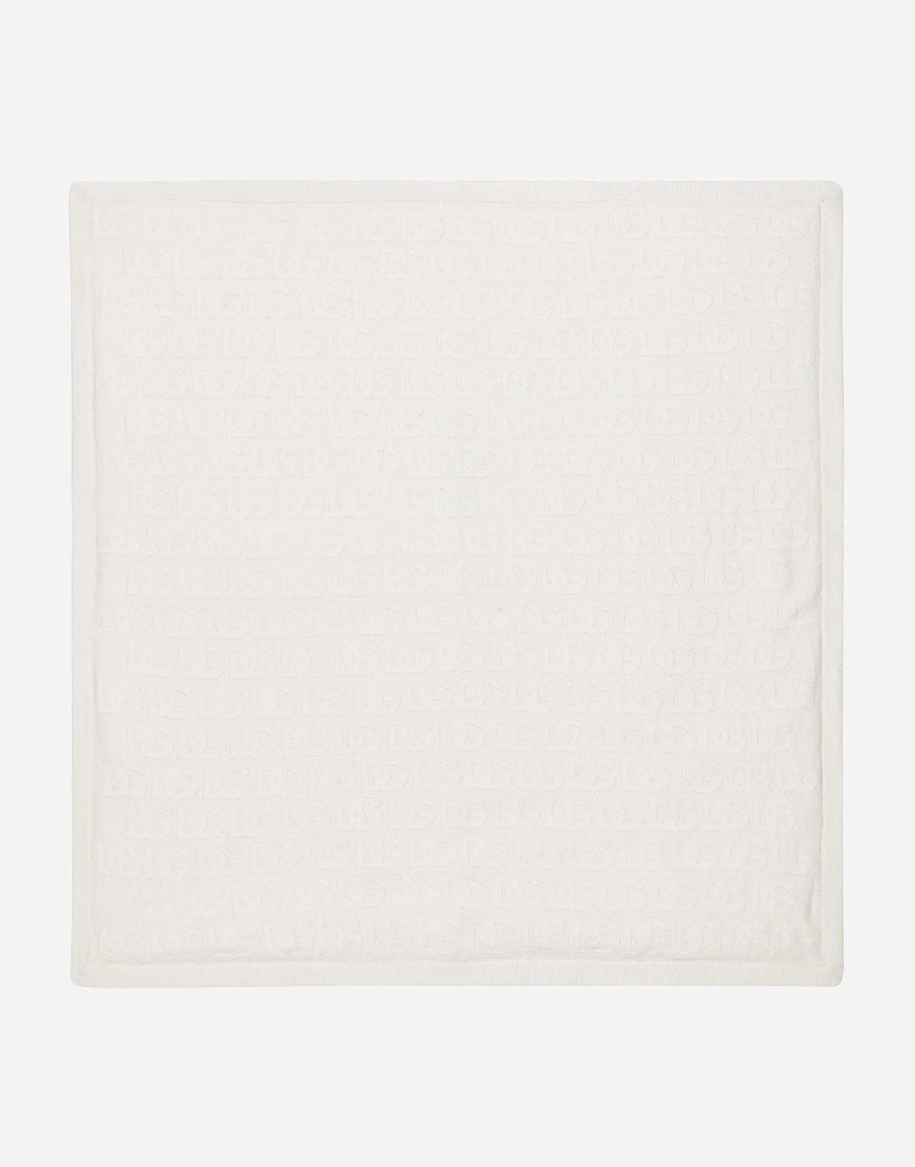 Knit blanket with jacquard logo