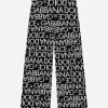 Knit pants with all-over jacquard logo