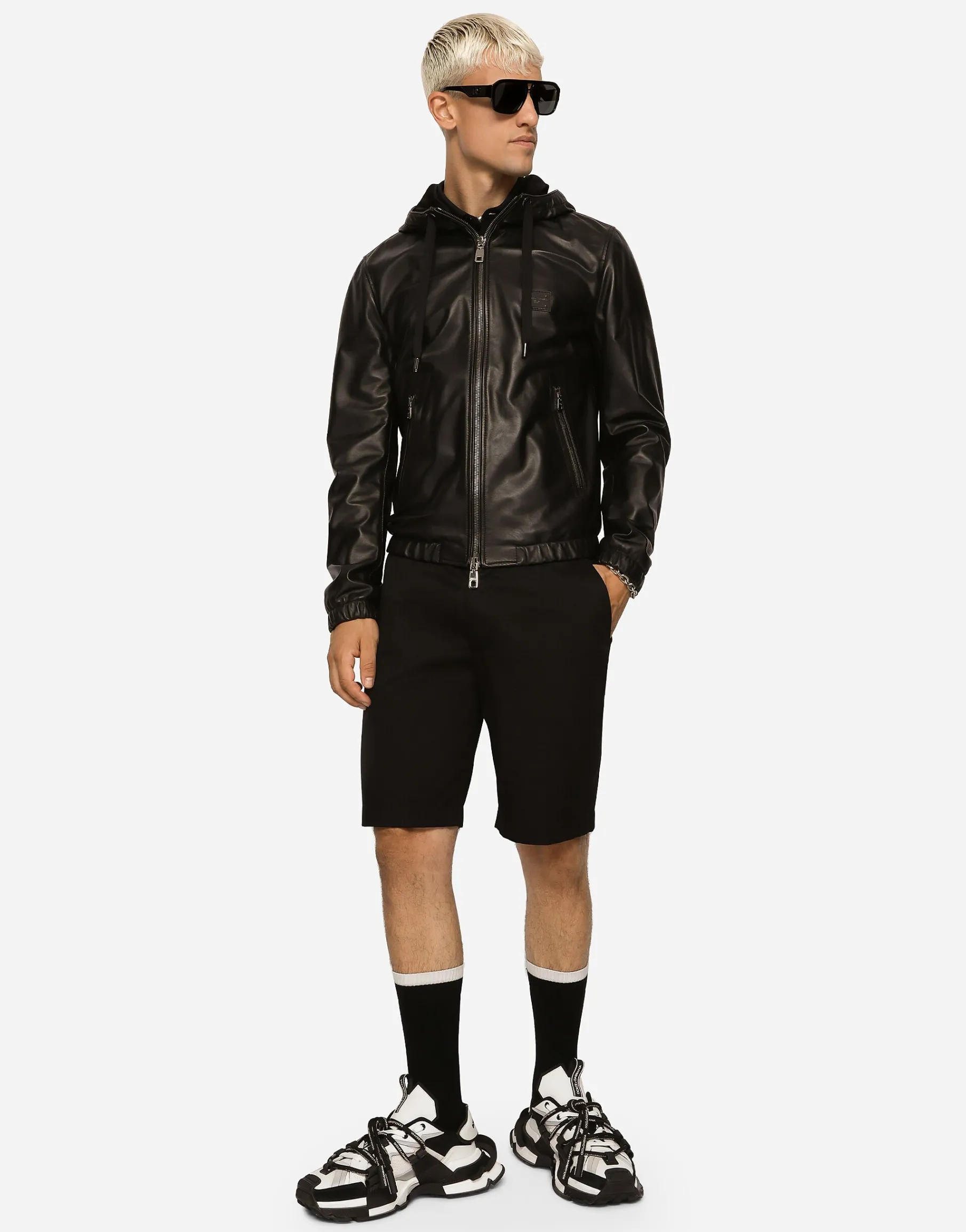 Leather jacket with hood and branded tag