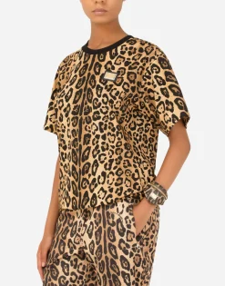 Leopard-print Crespo toiletry bag with branded plate