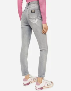 Light blue denim Grace jeans with ripped details