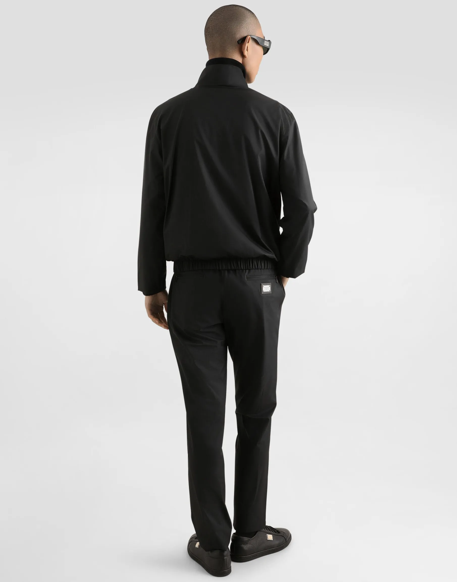 Light nylon jacket with branded tag