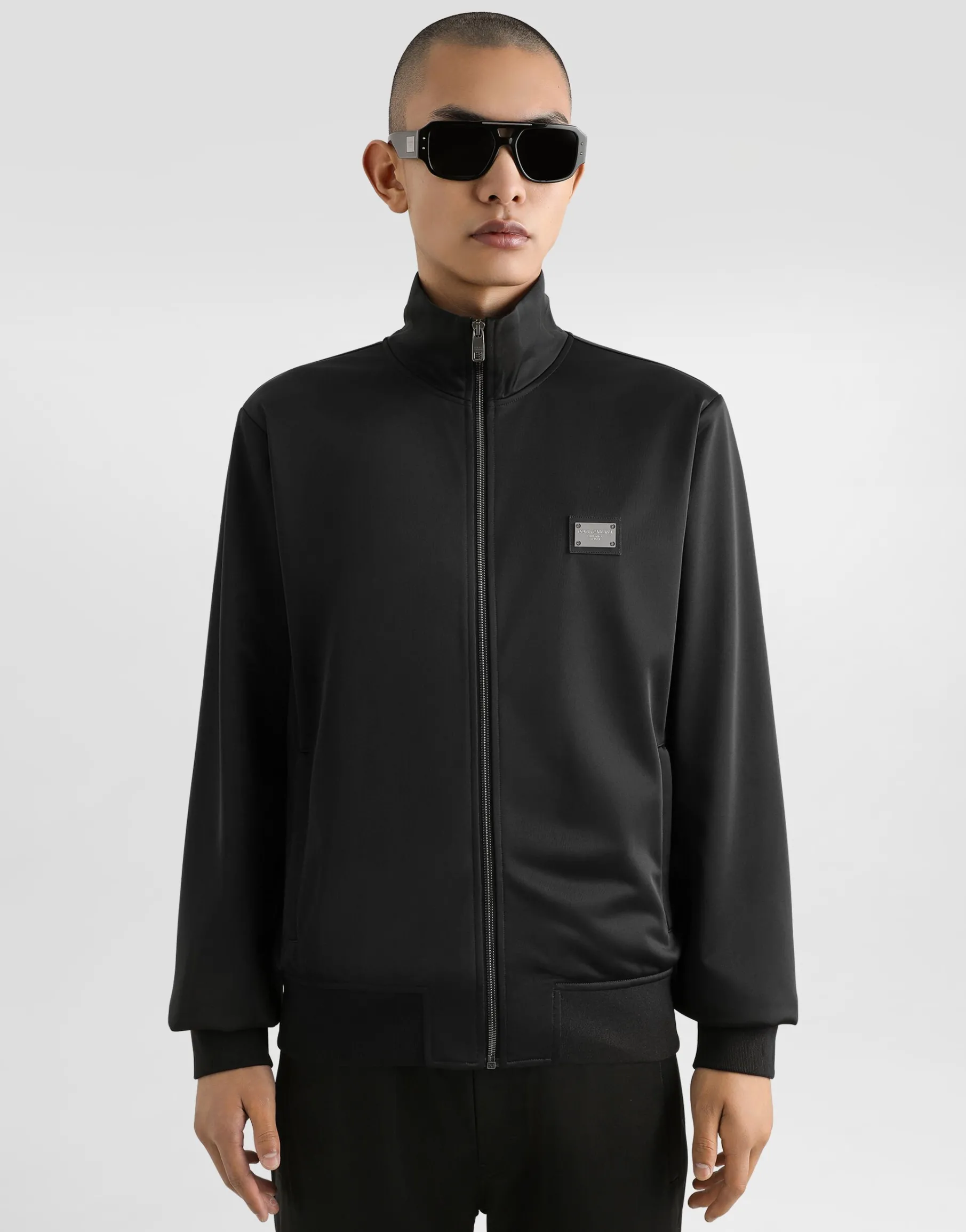 Light nylon jacket with branded tag