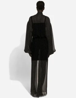 Long silk chiffon dress with polka-dot print, a pussy-bow detail and flower on neck