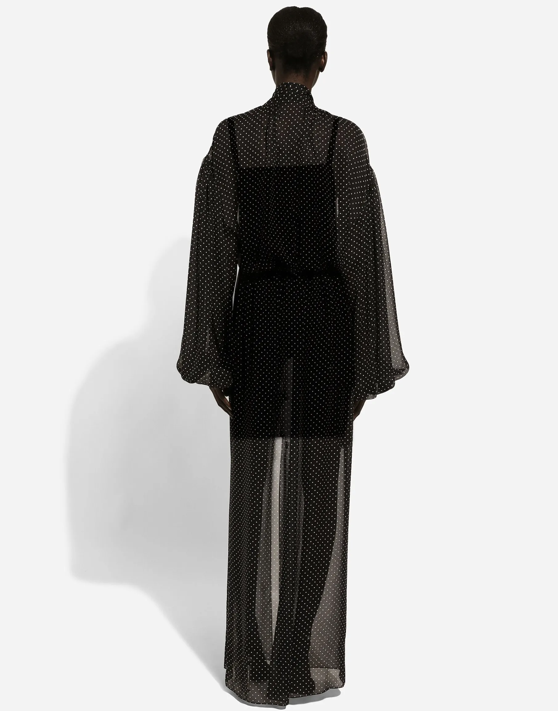 Long silk chiffon dress with polka-dot print, a pussy-bow detail and flower on neck