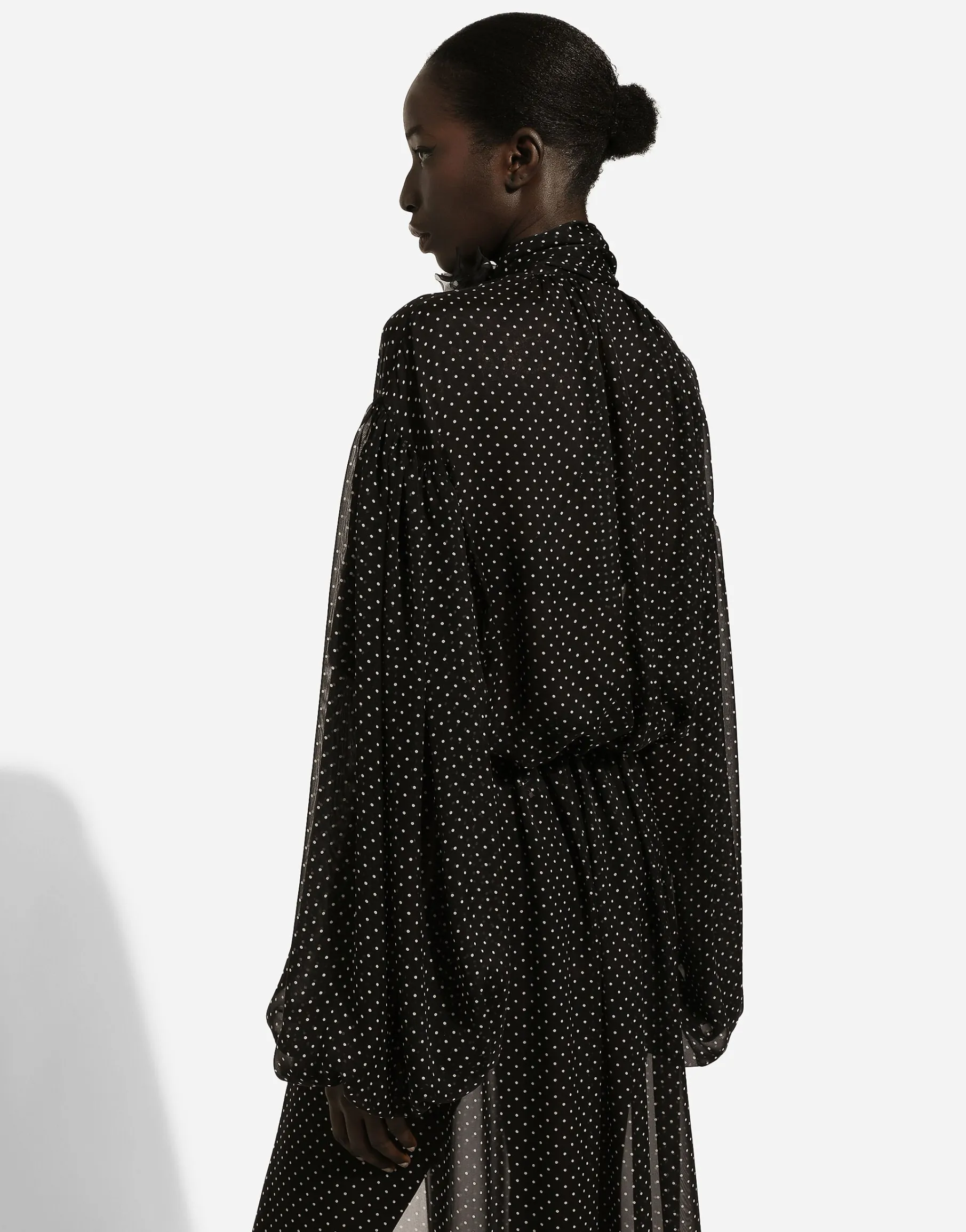Long silk chiffon dress with polka-dot print, a pussy-bow detail and flower on neck