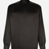 Loose silk turtleneck with shirt cuffs