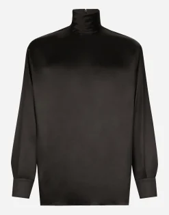 Loose silk turtleneck with shirt cuffs