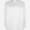 Loose silk turtleneck with shirt cuffs