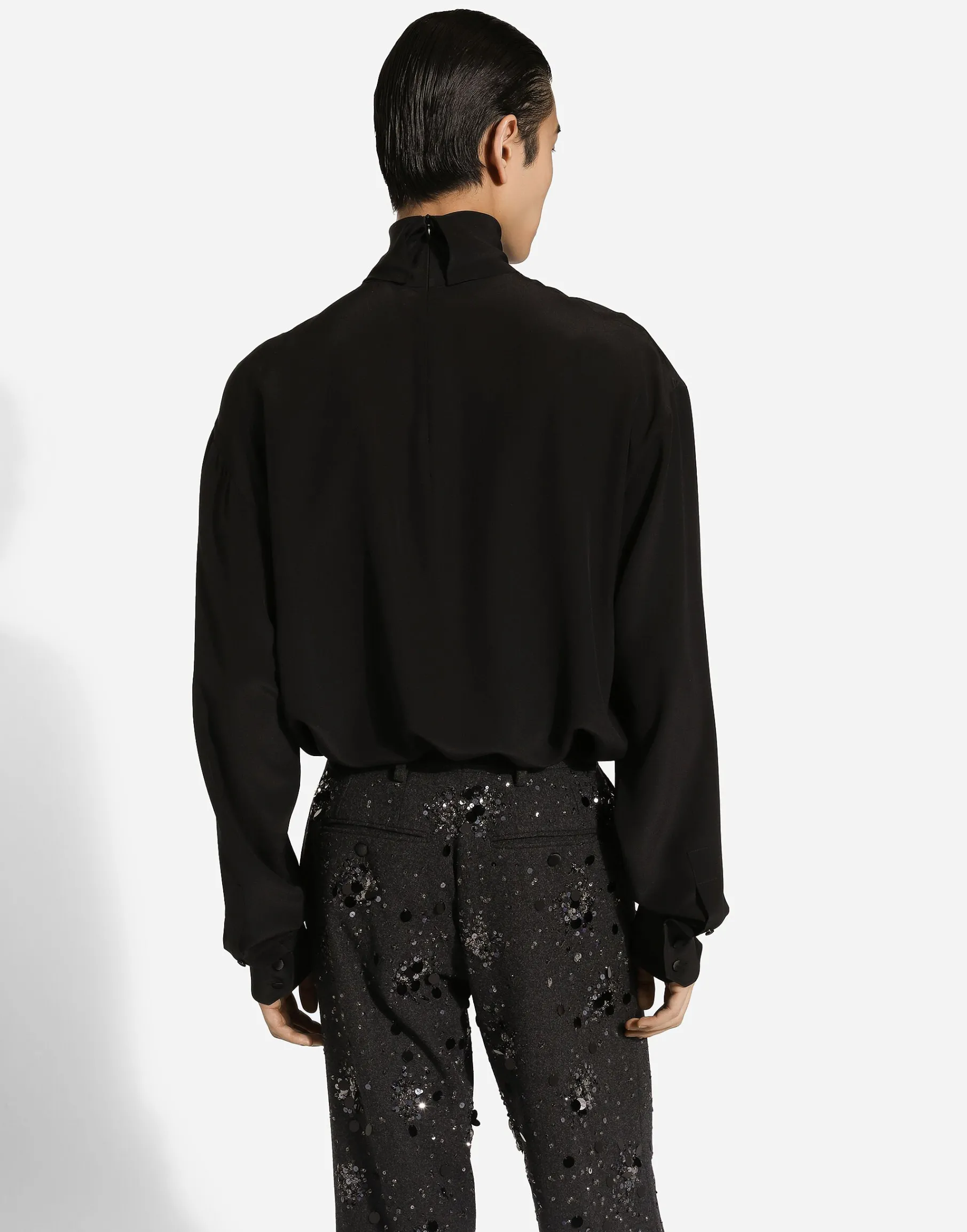 Loose silk turtleneck with shirt cuffs