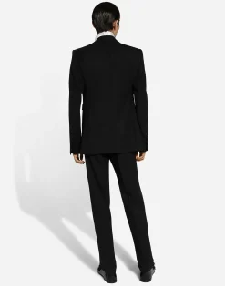 Loose silk turtleneck with shirt cuffs