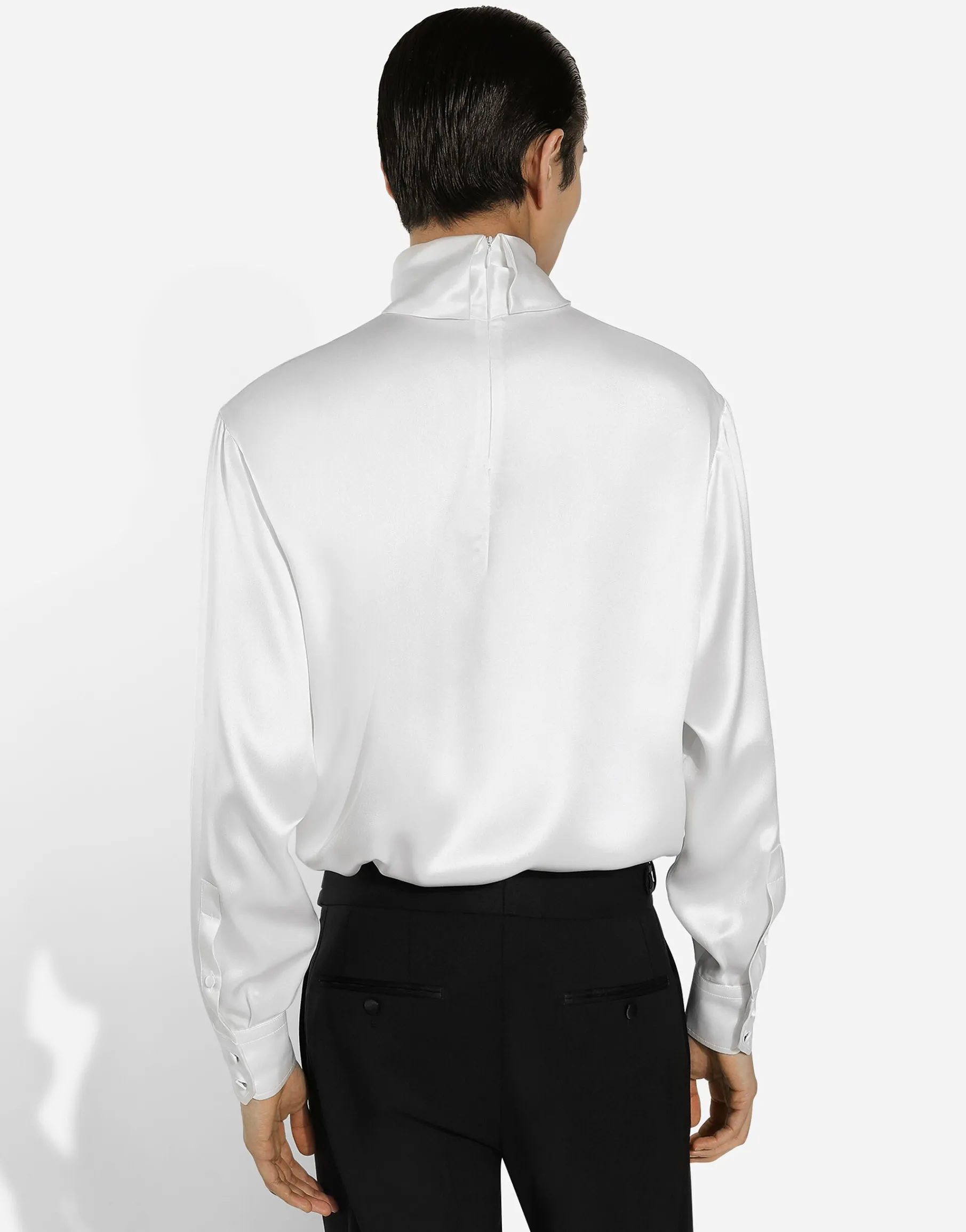 Loose silk turtleneck with shirt cuffs