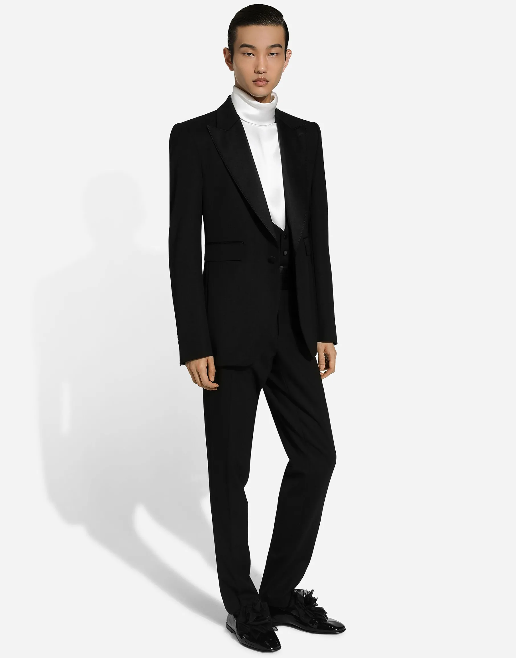 Loose silk turtleneck with shirt cuffs