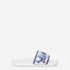 Majolica-print sliders with metal DG logo