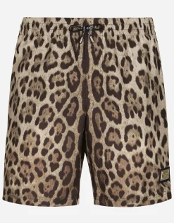 Mid-length swim trunks with leopard print