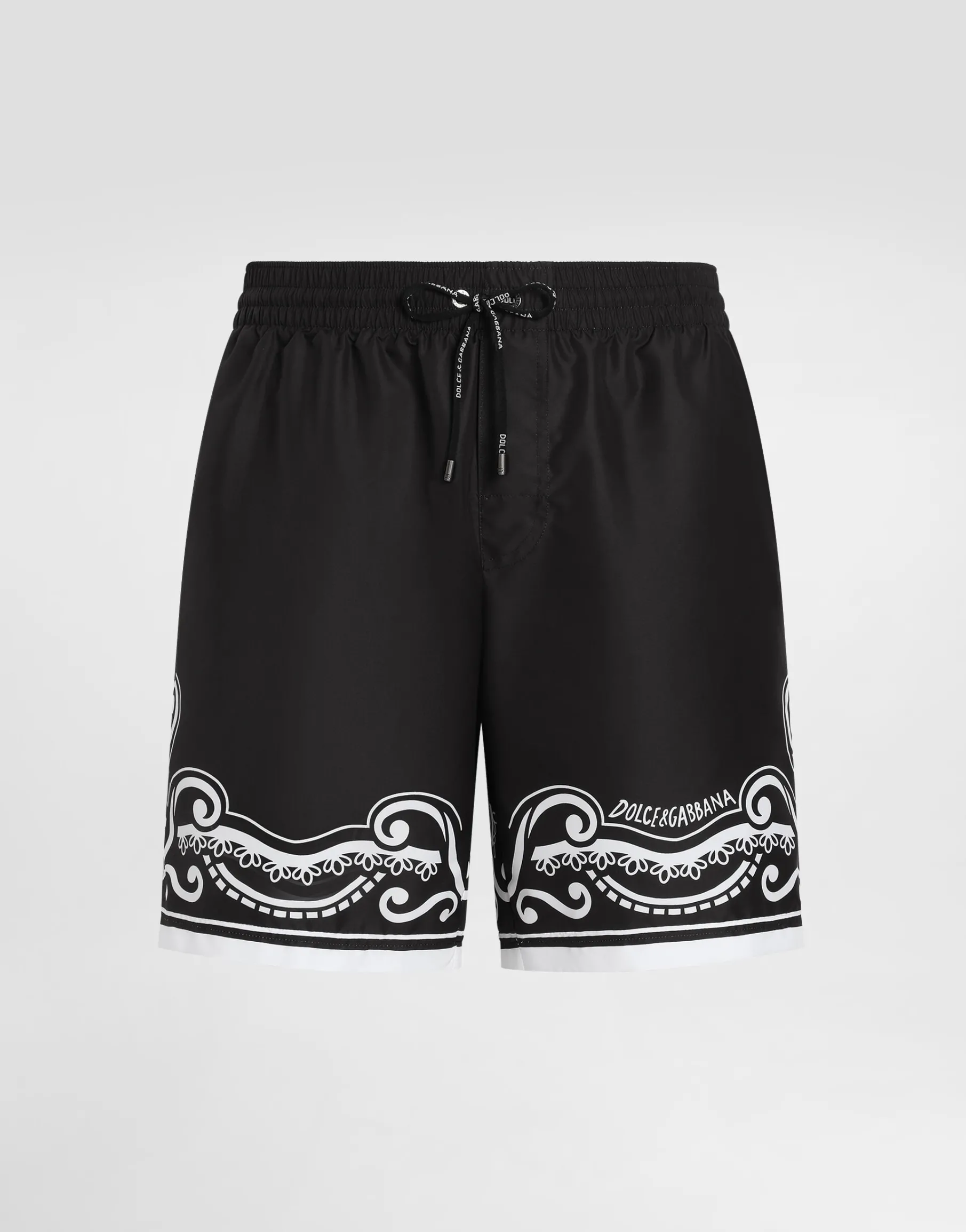 Mid-length swim trunks with bandanna print
