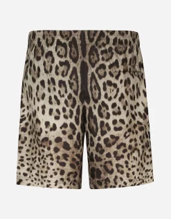 Mid-length swim trunks with leopard print