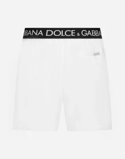 Mid-length swim trunks with branded stretch waistband