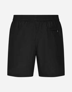 Mid-length swim trunks with logo tag
