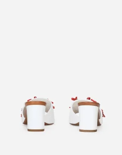 Nappa leather mules with coral embroidery
