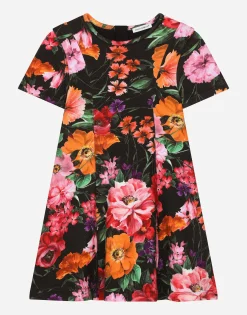 Neoprene dress with floral print over a black background