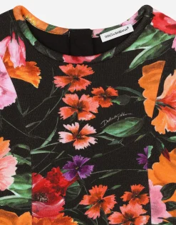 Neoprene dress with floral print over a black background